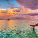 Tahiti,<br /><br />Miles of shoreline, dozens of resorts, French cuisine to die for – Tahiti has all the makings of a honeymoon destination. But beach bums often pass over Tahiti's sands in favor of Bora Bora's ivory shores. Despite its idyllic reputation and accessibility, Tahiti is more of an off-the-beaten-path stop than a romantic getaway. However, that doesn't mean Tahiti deserves to be ignored. Leafy forests sit beside sandy shores, French crêpes are served alongside Tahitian poisson cru (raw fish). If there ever was a place that embodies the beautiful duality of the French Polynesian archipelago, it's Tahiti. Here, the quirky, often chaotic atmosphere of the island's capital, Papeete, rubs elbows with uncorrupted natural