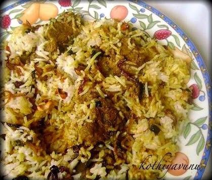 MALABAR CHICKEN BIRYANI<br /><br />Malabar Chicken Biriyani is a non vegetarian rice variety. This delicacy from the Malabar region of Kerala is very popular among Biriyani lovers.<br /><br />Ingredients<br />Basmathi rice - 1 kg<br />Chicken - 1<br />Biriyani Masala Paste<br />(green chilly, cinnamon, cloves, fennel, cardamom, peppercorn) - 4tbsp<br />Green chilly - 10<br />Ginger garlic paste - 2 tbsp<br />Coriander leaves - 50 g<br />Mint leaves - 25 g<br />Curd - 150 ml<br />Tomato - 150 g<br />Onion - 1 kg<br />Black cumin seeds - 1 tsp<br />Cinnamon stick - 2 pieces<br />Bay leaves - 2<br />Cashew nuts kismis - 50 g<br />Cardamom - 5<br />Ghee - 200 g<br />Coriander powder - 2 tbsp<br />Milk - 500 ml<br />Saffron - 1 pinch<br />Water (For rice) - 1 litre<br /><br />Method of preparation<br />Heat the ghee in a saucepan; saute the onions till golden brown colour and add sliced tomatoes saute well. Put ginger garlic paste, curd and biriyani masala and turmeric powder, and coriander powder. Add the chicken pieces and cook well. Soak the rice about 10 minutes and drain well. Melt the ghee in a saucepan and add in the spices and sliced onion mint, coriander leaves, cashew nuts, kismis, bay leaves and saute till brown in colour. Add milk and water. Allow to boil and then add rice. Lower the heat, cover and continue to cook for 15 minutes. Take another saucepan and place half the rice into it. And add the chicken on the top of the rice. And put the remaining rice on top of the chicken. And spread to make an even layer. Make random holes through the rice with a spoon and pour into each a little saffron milk. Place a few knobs of ghee, fried onion, cashew nuts and kismis on the surface and cover tightly.