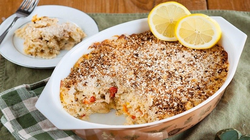 Salmon Casserole<br /><br />This creamy, cheese-filled casserole makes a great springtime meal for the whole family.<br />INGREDIENTS<br /><br />Select ingredients:<br />3 tablespoons butter<br />1 cup onion, diced<br />½ cup red bell pepper, chopped<br />½ cup yellow bell pepper, chopped<br />2 tablespoons flour<br />½ teaspoon black pepper<br />2½ cups milk<br />4 ounces Gouda cheese, grated<br />4 ounces Monterey Jack cheese, grated<br />The juice of half a lemon<br />1 teaspoon lemon zest<br />8 ounces of your favorite pasta, cooked and drained<br />One 10-ounce package of salmon (skin and bones removed)<br />1 cup plain panko breadcrumbs<br />2 tablespoons parsley<br />SAVE CHECKED INGREDIENTS TO SHOPPING LIST<br />DIRECTIONS<br /><br />Melt the butter in a large skillet and sauté the onions and peppers for approximately 5 minutes.<br />Add in the flour and ¼ teaspoon of the black pepper, stir until well combined.<br />Add the milk and continue stirring constantly over medium heat until it thickens slightly.<br />Stir in the parsley and grated cheeses until melted.<br />Add the lemon juice and lemon zest and stir.<br />Remove the skillet from the heat.<br />Place the cooked pasta, the cheese sauce, and the salmon in a large bowl and combine. Transfer to a 2½- to 3-quart baking dish and top with the breadcrumbs, the remaining black pepper, and the remaining parsley.<br />Bake in a 350-degree oven for 30 to 40 minutes or until thoroughly heated.