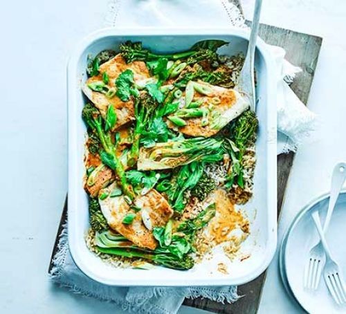 Coconut fish curry traybake<br /><br />Ingredients<br /><br />2 x 250g pouches cooked brown rice<br />160ml can coconut milk<br />4 tbsp Thai red curry paste<br />1 tbsp fish sauce<br />4 fillets white fish (around 120g each)<br />200g pack Tenderstem broccoli<br />235g pack pak choi<br />½ small bunch spring onions<br />, sliced on the diagonal<br />small pack coriander, leaves picked<br />2 limes<br />, cut into wedges, to serve<br />Method<br /><br />Heat oven to 200C/180C fan/gas 6. Tip the rice into a roasting tin. Whisk the coconut milk with the curry paste and fish sauce. Nestle the fish into the rice, put the broccoli, pak choi and half the spring onions on top, and season. Drizzle the coconut mixture over everything, cover with foil and cook in the oven for 25 mins or until the veg is cooked through and the fish is flaking apart.<br />Serve in bowls, topped with coriander leaves and the remaining spring onions, with lime wedges on the side.