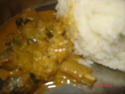 NATU KODI KURA~COUNTRY CHICKEN CURRY<br /><br />Country chicken cooked in a very spicy way is an all time favorite of rayalaseema non-vegetarian  people.<br />though this is not  as spicy as usually made, it tastes the same.I have been to my mom's place recently and she cooked this for me!!. hope you all like it.<br /><br />Ingredients:<br /> 1kg country chicken cut into small pieces<br /> 2 large onion sliced<br /> 1/2 tsp turmeric powder<br /> Salt to taste<br /> 2-3 tsp chilli powder<br /> 2 tsp corriander powder<br /> 10-12 curry leaves<br /> 2 cardamom pods(elaichi)<br /> 3cinnamon sticks(dalchinichakka)<br /> 7-8 pepper corns<br /> 5-6 tsp of oil<br /> 100 gms fresh coconut<br /> 10 gms poppy seeds(gasalu)<br /> 20 gms ginger<br /> 1 small garlic<br /> corriander for garnish<br /><br />Process:<br />1.wash the chicken pieces and keep aside.<br /> 2.Grind coconut,poppy seeds,ginger,garlic and one onion into a smooth paste.<br /> 3.Now take a pan and heat oil and add chopped onions to it.<br />4.When the onions are fried add the chicken pieces to it.<br />5. Now add turmeric powder and salt to it.<br /> 6.After frying for 5 minutes add the grinded paste to it.<br />7.Stir it well. and fry for another five minutes.<br />8.Add chilli powder to it.<br />9.After mixing well add corriander powder to it.<br />10. It takes more amount of water and time for the country chicken to cook than the ordinary ones.<br /> so pour about 3 glasses of water to it.<br />11.Add the curry leaves to it.<br />12. Now close the lid and cook for about16-17 minutes.<br /> 13.Now add the grinded spices(elaichi,cardamom,cinnamon,pepper corns and poppy seeds).<br />14. Lastly add corriander and serve hot with rice or sangati or chapathi.